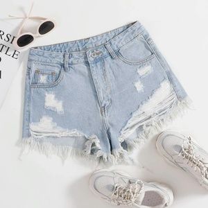 Ripped raw cut denim shorts
